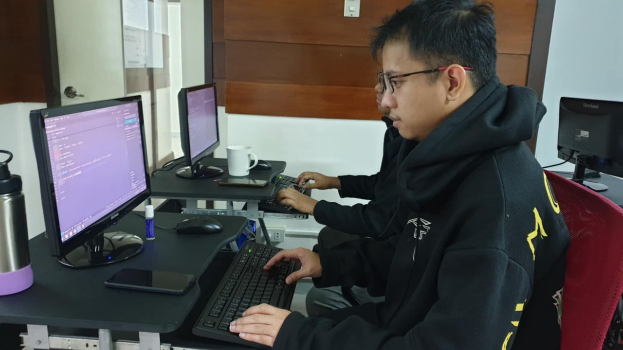 Jhonmar completing exercises during PHP and MySQL training
